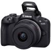 Canon EOS R50 Cámara mirrorless con objetivo 18-45 mm vista de perfil con flash abierto